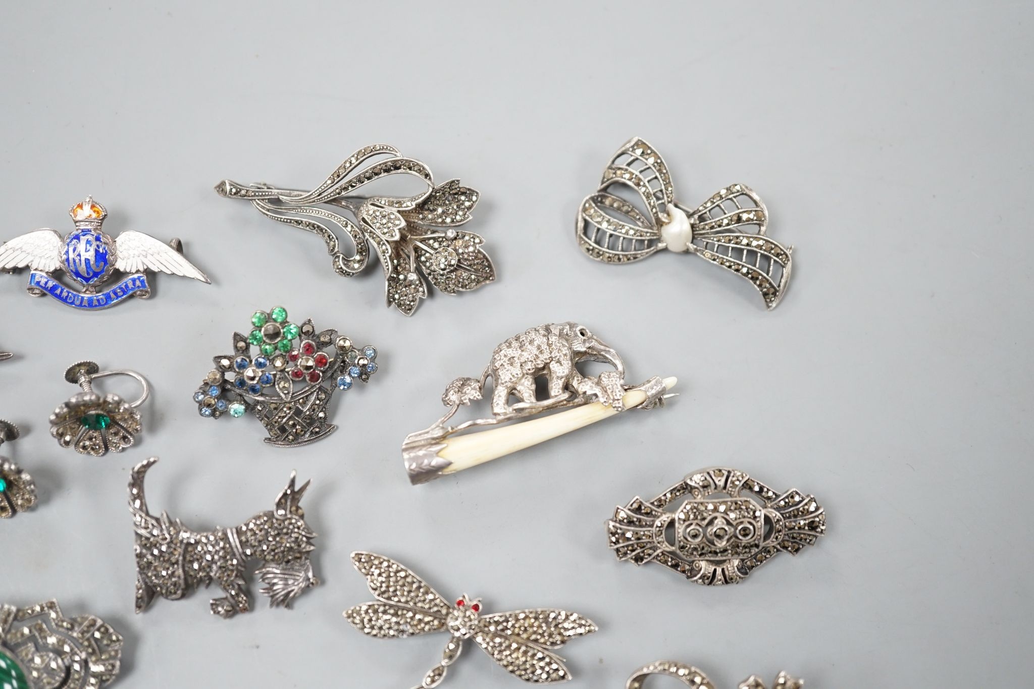 A small collection of assorted mainly white metal and marcasite set jewellery, including brooches, bracelet etc. and an enamelled RAF brooch.
